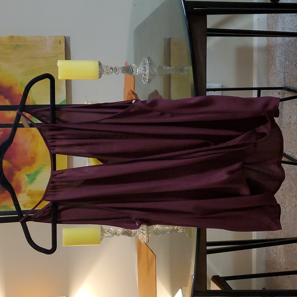 Lush sleeveless burgundy open front top